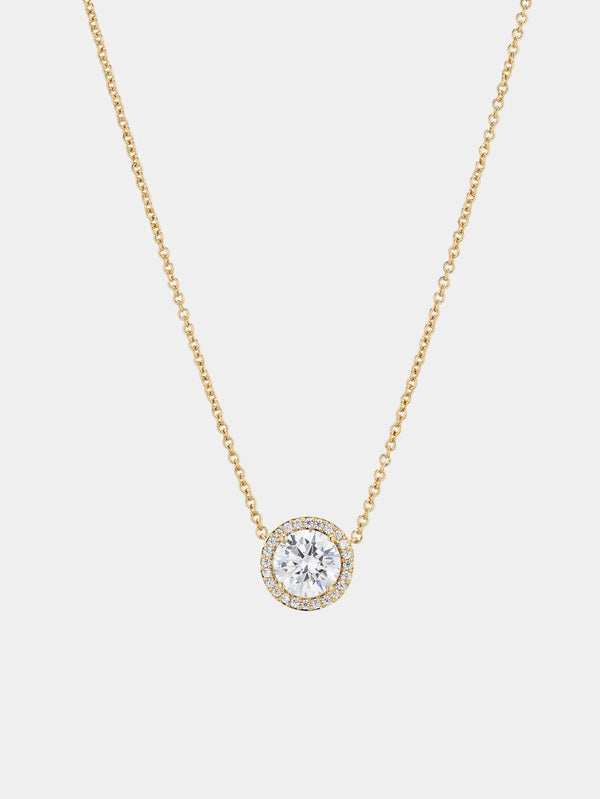 Solitair diamond necklace with small stones around 