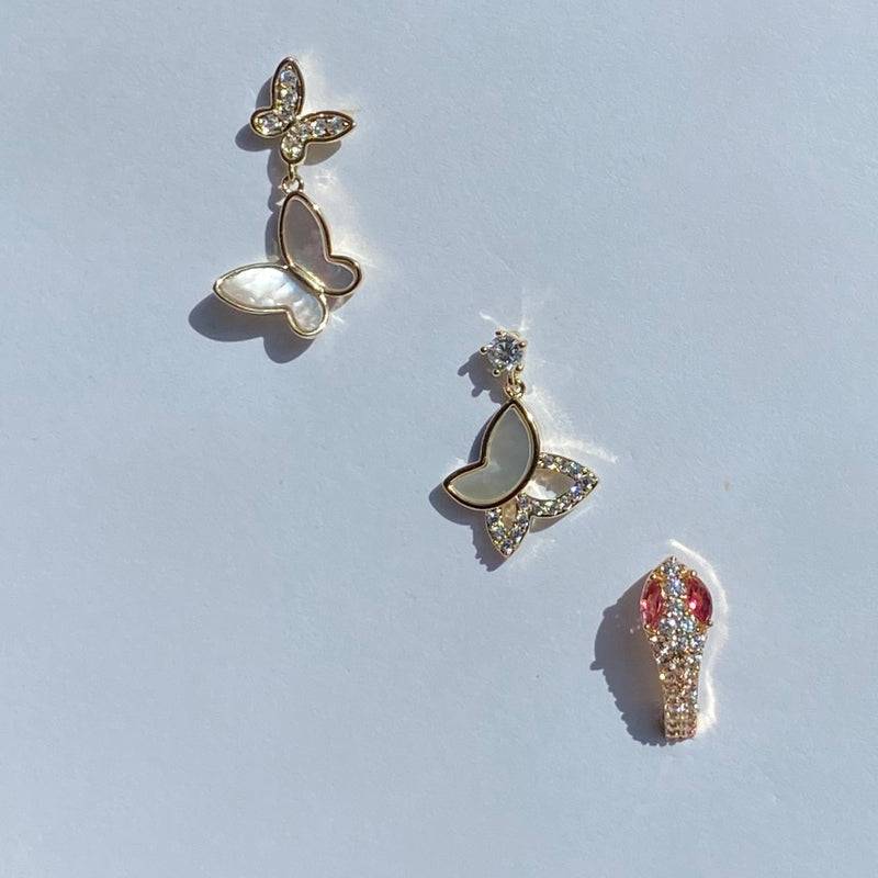 Vilnder oorbel|butterfly earring|gouden oorbel slang|snake earring gold |hippe sieraden|fashion jewelry|gold earrings|sieraden webshop|sieraden goedkoop|my jewellery|originele sieraden