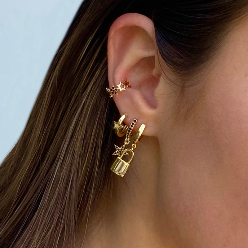 fine jewelry|trendy earrings|star earrings|earrings with black stones|ear cuff gold|ear cuff met sterren