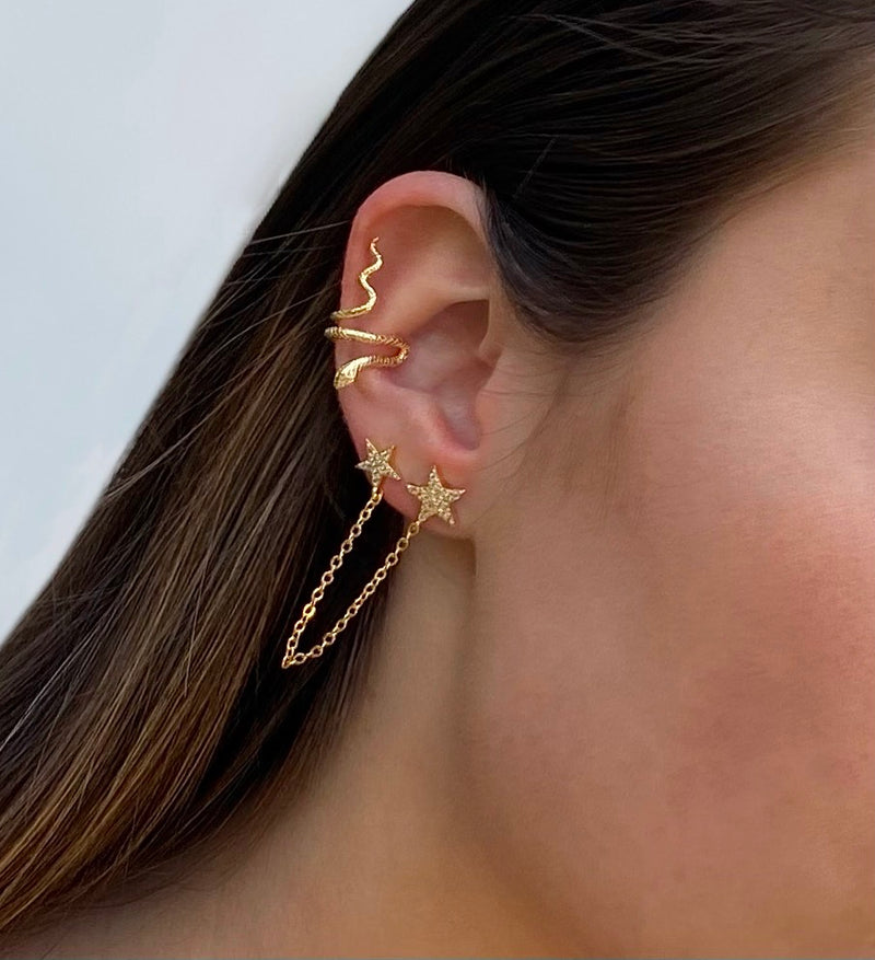 oorbellen met ketting|oorbellen met kettinkje goud|hippe oorbellen|oorbellen zonder gaatje|fanatsie oorbellen|oorbellen met ster en kettinkje|gouden ster oorbellen
